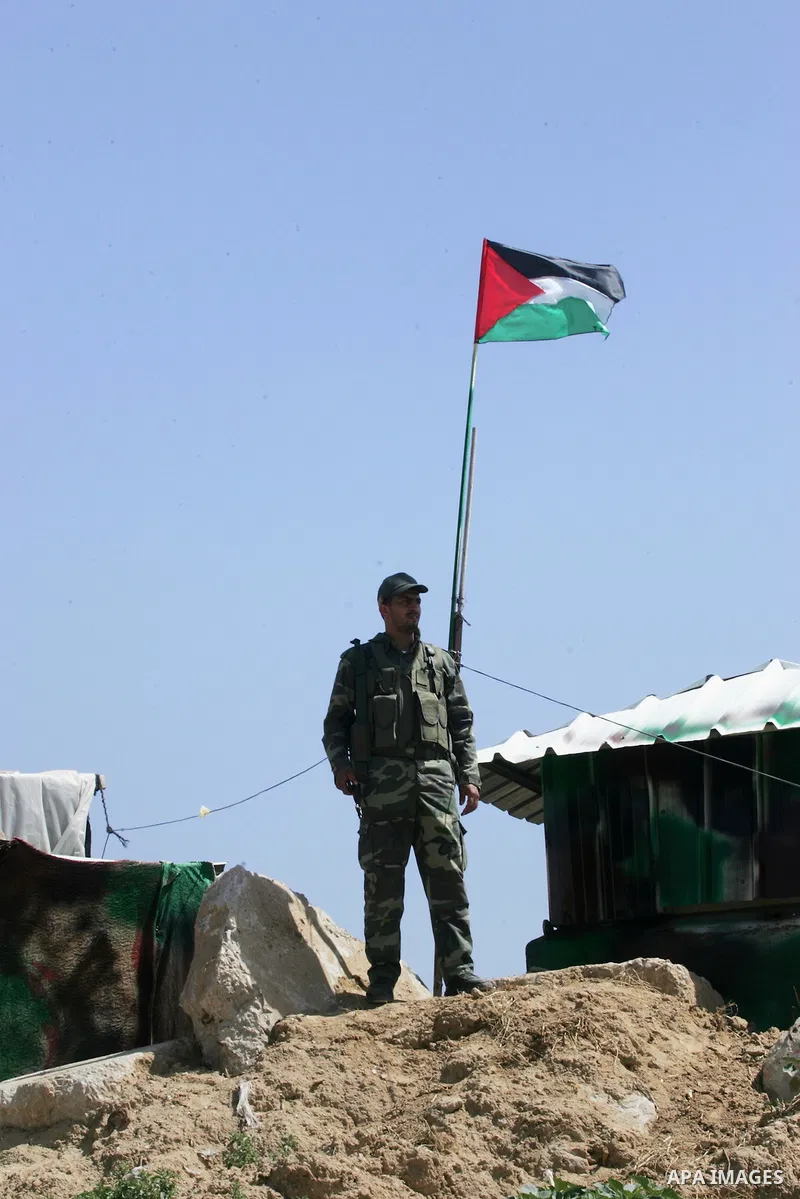A member of Palestinian security forces loyal to Hamas looks on as he is deployed to maintain security on the border of southern Gaza Strip with Egypt, April 21, 2016. Hamas began deploying additional forces on the Gaza...