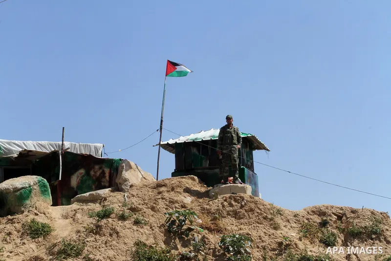 A member of Palestinian security forces loyal to Hamas looks on as he is deployed to maintain security on the border of southern Gaza Strip with Egypt, April 21, 2016. Hamas began deploying additional forces on the Gaza...