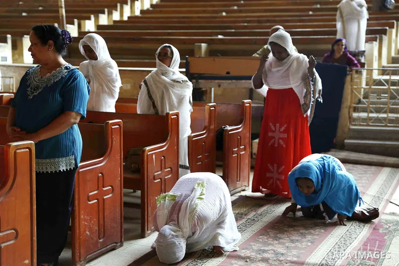 Egyptian Coptic Christian attend the Palm Sunday celebrations at the Deir Samaan Church in Cairo, Egypt, Saturday, April 24, 2016. Photo by Amr Sayed