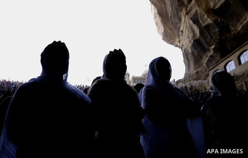 Egyptian Coptic Christian attend the Palm Sunday celebrations at the Deir Samaan Church in Cairo, Egypt, Saturday, April 24, 2016. Photo by Amr Sayed