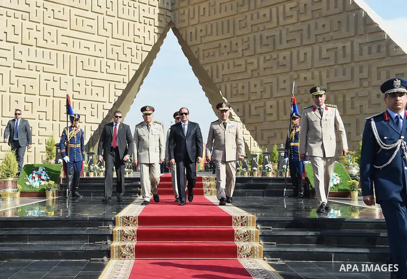 Egyptian President Abdel Fattah al-Sisi lays a wreath at the memorial to the martyrs of the Armed Forces to mark the anniversary of the liberation of Sinai, in Cairo on April 24, 2016. Photo by Egyptian President Office