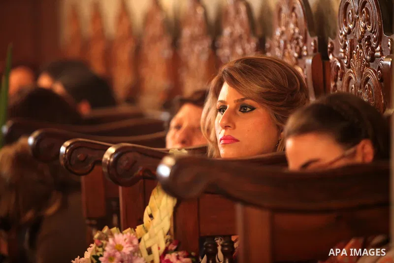 Palestinian Christians take part in the Greek Orthodox Christian Palm Sunday celebrations at St.Porphyrios Church in Gaza City, on April 24, 2016. Palm Sunday marks the triumphant return of Jesus Christ to Jerusalem when...