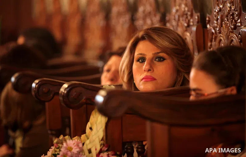 Palestinian Christians take part in the Greek Orthodox Christian Palm Sunday celebrations at St.Porphyrios Church in Gaza City, on April 24, 2016. Palm Sunday marks the triumphant return of Jesus Christ to Jerusalem when...