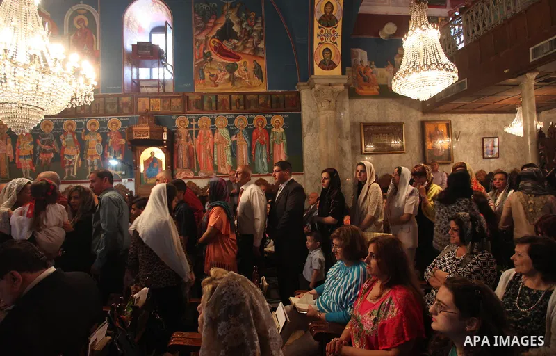 Palestinian Christians take part in the Greek Orthodox Christian Palm Sunday celebrations at St.Porphyrios Church in Gaza City, on April 24, 2016. Palm Sunday marks the triumphant return of Jesus Christ to Jerusalem when...