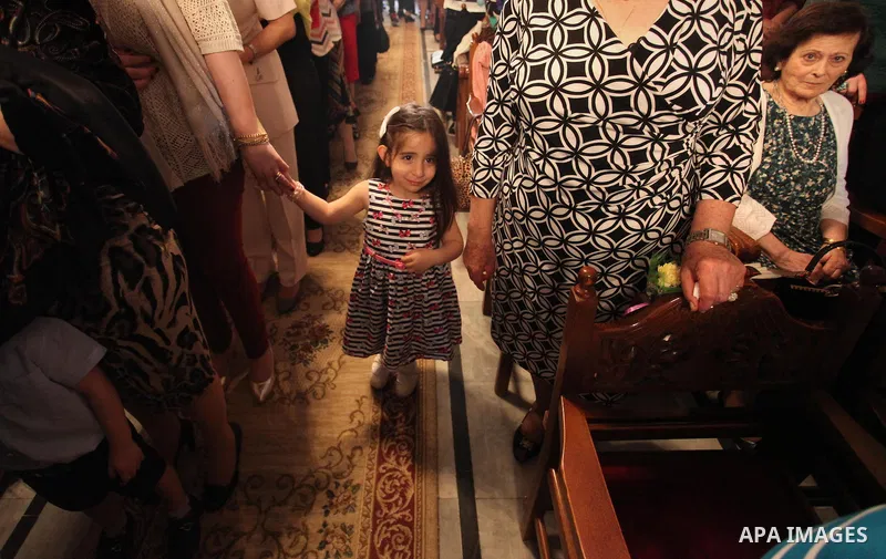Palestinian Christians take part in the Greek Orthodox Christian Palm Sunday celebrations at St.Porphyrios Church in Gaza City, on April 24, 2016. Palm Sunday marks the triumphant return of Jesus Christ to Jerusalem when...