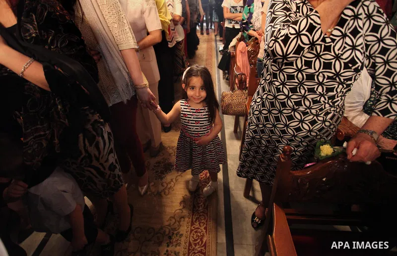 Palestinian Christians take part in the Greek Orthodox Christian Palm Sunday celebrations at St.Porphyrios Church in Gaza City, on April 24, 2016. Palm Sunday marks the triumphant return of Jesus Christ to Jerusalem when...