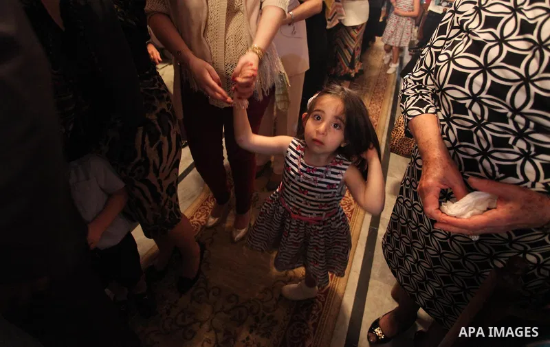 Palestinian Christians take part in the Greek Orthodox Christian Palm Sunday celebrations at St.Porphyrios Church in Gaza City, on April 24, 2016. Palm Sunday marks the triumphant return of Jesus Christ to Jerusalem when...