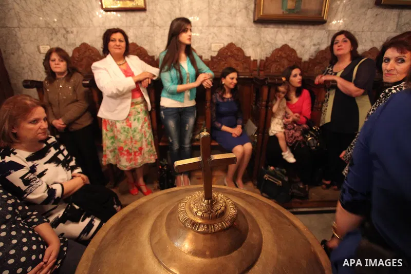 Palestinian Christians take part in the Greek Orthodox Christian Palm Sunday celebrations at St.Porphyrios Church in Gaza City, on April 24, 2016. Palm Sunday marks the triumphant return of Jesus Christ to Jerusalem when...