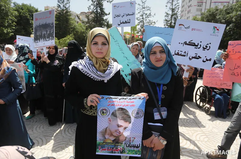 Disabled Palestinians take part in a protest to demand their rights to work, in Gaza city, on April 25, 2016. Photo by Mohammed Asad