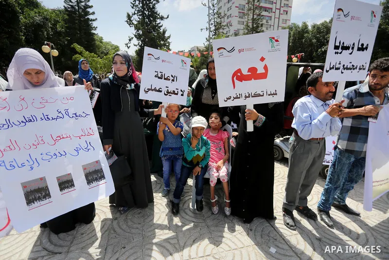 Disabled Palestinians take part in a protest to demand their rights to work, in Gaza city, on April 25, 2016. Photo by Mohammed Asad