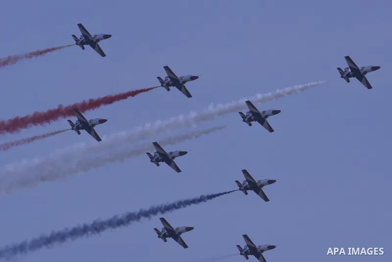 Egyptian air force planes participate in an air parade during a celebration the anniversary of Sinai Liberation Day in Cairo, Egypt, April 25, 2016. Photo by Amr Sayed