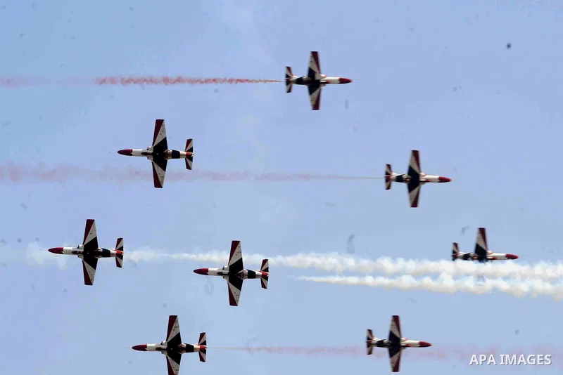 Egyptian air force planes participate in an air parade during a celebration the anniversary of Sinai Liberation Day in Cairo, Egypt, April 25, 2016. Photo by Amr Sayed