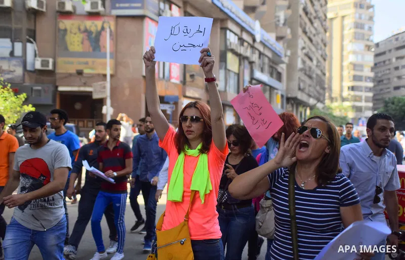 Egyptian protesters chant slogans during a demonstration in Cairo on April 25, 2016, against the handing over of two Red Sea islands to Saudi Arabia. Egyptian police fired tear gas at protesters in the Egyptian capital w...