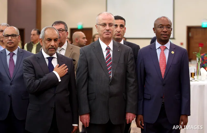 Palestinian Prime Minister, Rami Hamdallah, meets with the representative of South Africa to the Palestine Ashraf Suleiman, in the West Bank city of Ramallah, on April 26, 2016. Photo by Prime Minister Office