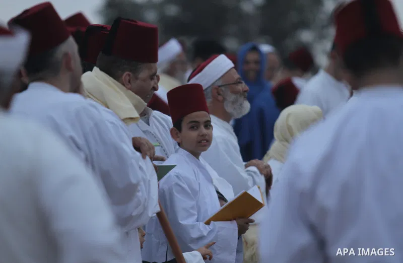 Members of the Samaritan sect take part in a traditional pilgrimage marking the holiday of Passover atop Mount Gerizim near the West Bank city of Nablus, on April 27, 2015. Photo by Nedal Eshtayah