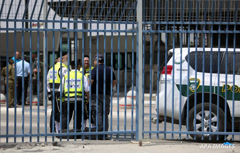 Israeli security forces stand guard at the Qalandia checkpoint, between Jerusalem and Ramallah in the Israeli occupied West Bank, after two Palestinians were shot as they approached security at the border carrying a knif...