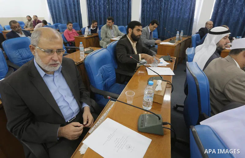 Members of the Palestinian legislative council from Hamas movement attend a meeting at the legislative council in Gaza city on, on April 27, 2016. Photo by Mohammed Asad