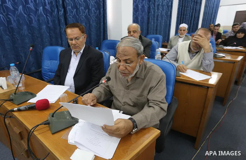 Members of the Palestinian legislative council from Hamas movement attend a meeting at the legislative council in Gaza city on, on April 27, 2016. Photo by Mohammed Asad
