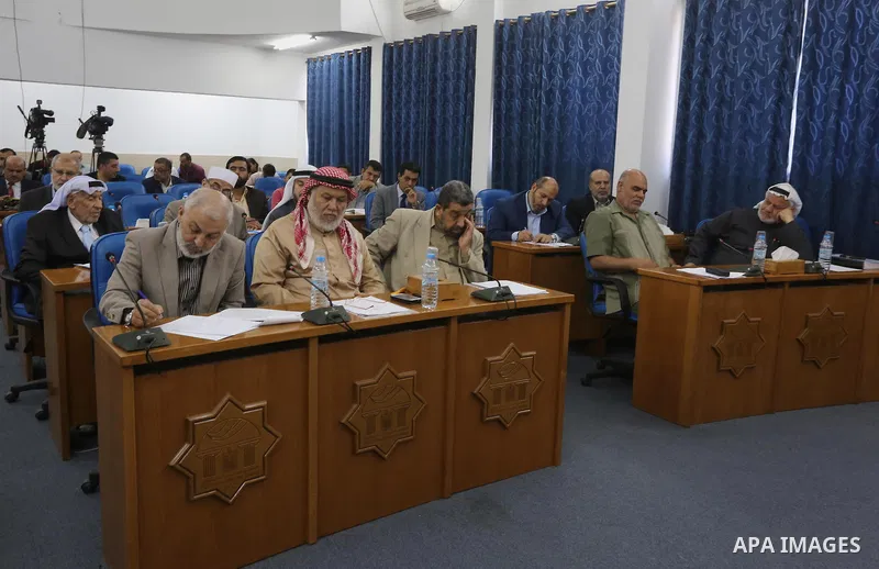 Members of the Palestinian legislative council from Hamas movement attend a meeting at the legislative council in Gaza city on, on April 27, 2016. Photo by Mohammed Asad