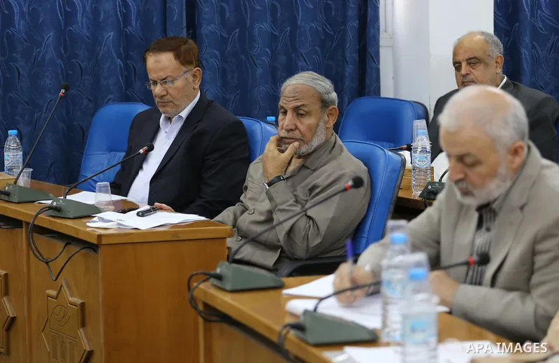 Members of the Palestinian legislative council from Hamas movement attend a meeting at the legislative council in Gaza city on, on April 27, 2016. Photo by Mohammed Asad
