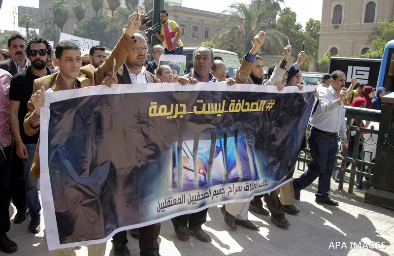 Egyptian Journalists take part during a protest against the restriction of press freedom and to demand the release of detained journalists, in Cairo, Egypt, on April 28, 2016. Photo by Amr Sayed