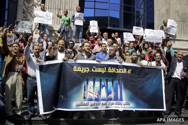 Egyptian Journalists take part during a protest against the restriction of press freedom and to demand the release of detained journalists, in Cairo, Egypt, on April 28, 2016. Photo by Amr Sayed