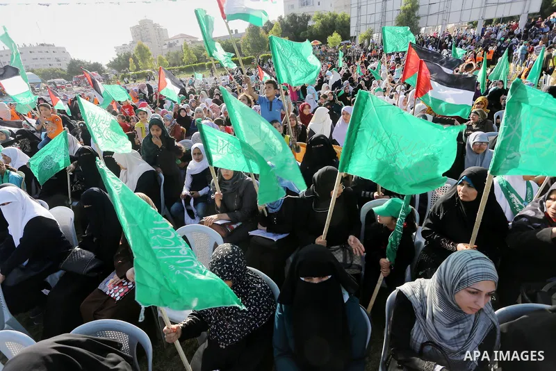 Palestinian supporters of the Islamist movement Hamas take part during an anti-Israel rally in Gaza City on April 28, 2016. Photo by Mohammed Asad
