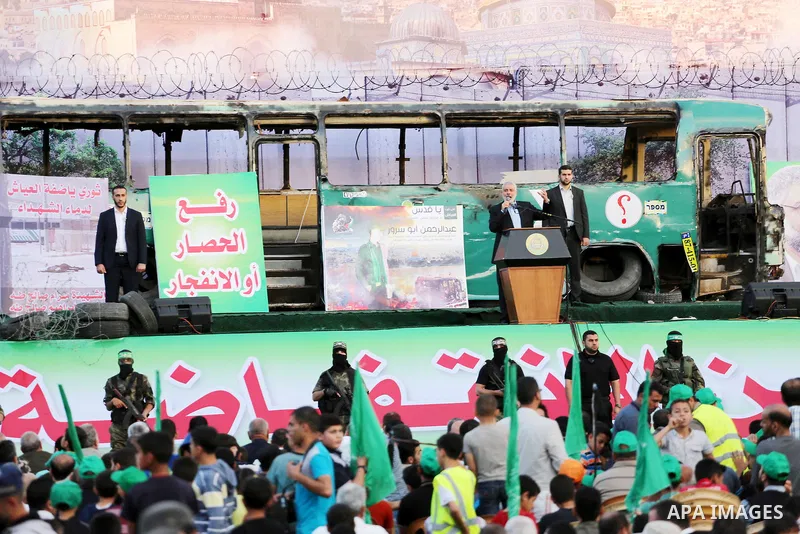 The head of the Islamist Palestinian movement Hamas, Ismail Haniya speaks during an anti-Israel rally in Gaza City on April 28, 2016. Photo by Mohammed Asad