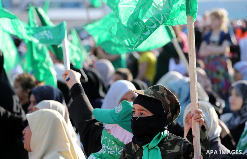 Palestinian supporters of the Islamist movement Hamas take part during an anti-Israel rally in Gaza City on April 28, 2016. Photo by Mohammed Asad