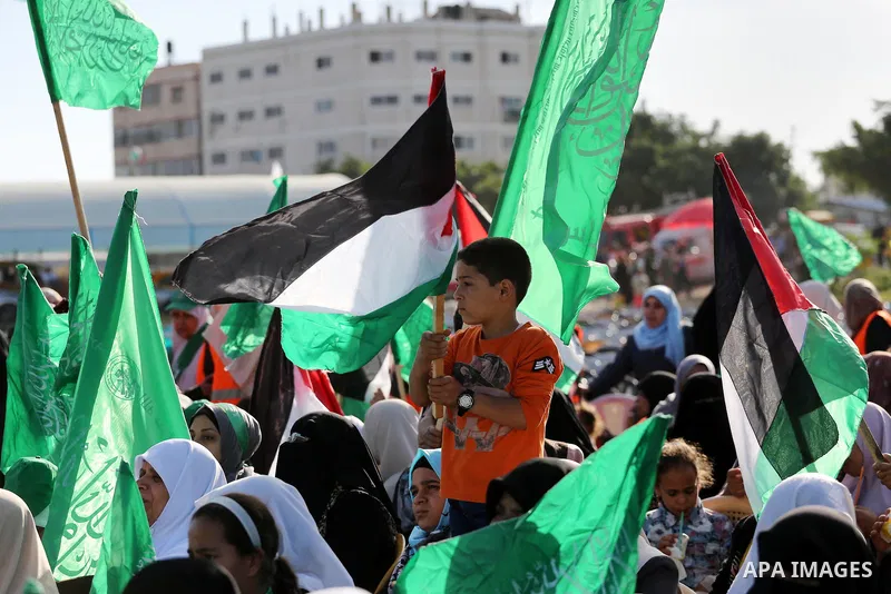 Palestinian supporters of the Islamist movement Hamas take part during an anti-Israel rally in Gaza City on April 28, 2016. Photo by Mohammed Asad