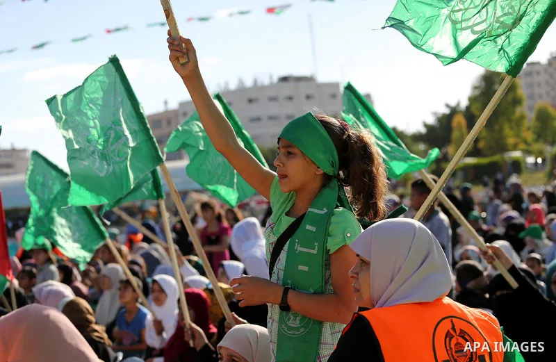 Palestinian supporters of the Islamist movement Hamas take part during an anti-Israel rally in Gaza City on April 28, 2016. Photo by Mohammed Asad