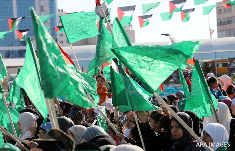 Palestinian supporters of the Islamist movement Hamas take part during an anti-Israel rally in Gaza City on April 28, 2016. Photo by Mohammed Asad