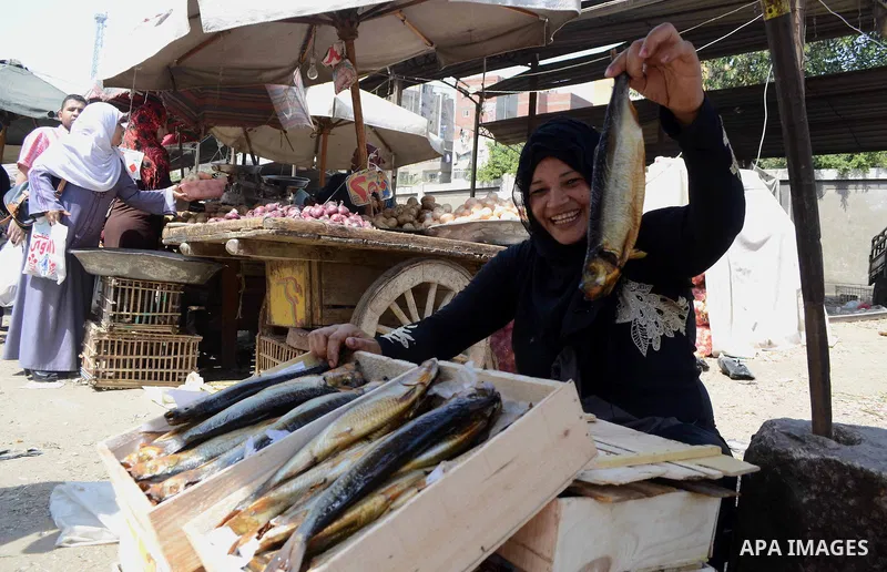 Egyptians buy the Herring or, salted fish during preparation for the upcoming the Sham El Nessim, or the Festival of Spring Breeze, which marks the beginning of spring, in Cair, on April 30, 2016. Photo by Amr Sayed
