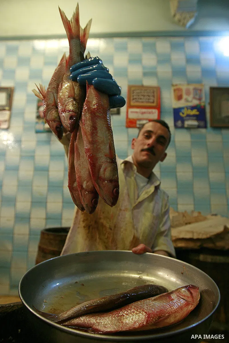 Egyptians buy the Herring or, salted fish during preparation for the upcoming the Sham El Nessim, or the Festival of Spring Breeze, which marks the beginning of spring, in Cair, on April 30, 2016. Photo by Amr Sayed