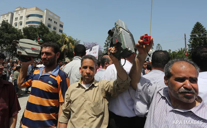 Palestinian workers demonstrate against the Israeli blockade of the Gaza Strip during a rally marking May Day, on May 1, 2016, in Gaza City. Israel has maintained a blockade of Gaza since 2006, and recently banned the su...