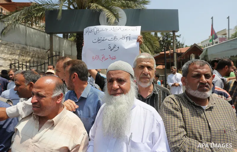 Palestinian workers demonstrate against the Israeli blockade of the Gaza Strip during a rally marking May Day, on May 1, 2016, in Gaza City. Israel has maintained a blockade of Gaza since 2006, and recently banned the su...