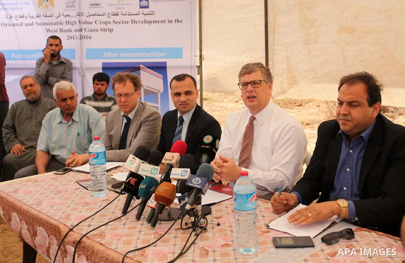 Representative for the Netherlands to the Palestinian Authority Peter Mollema speaks to media as he visits a Dutch-funded project aimed at suppling farms with water, in Khan Younis in the southern Gaza Strip May 1, 2016....