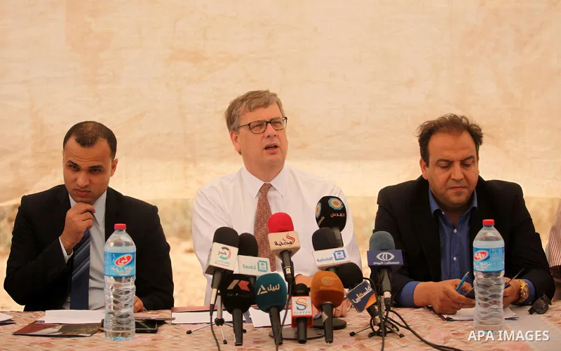 Representative for the Netherlands to the Palestinian Authority Peter Mollema speaks to media as he visits a Dutch-funded project aimed at suppling farms with water, in Khan Younis in the southern Gaza Strip May 1, 2016....