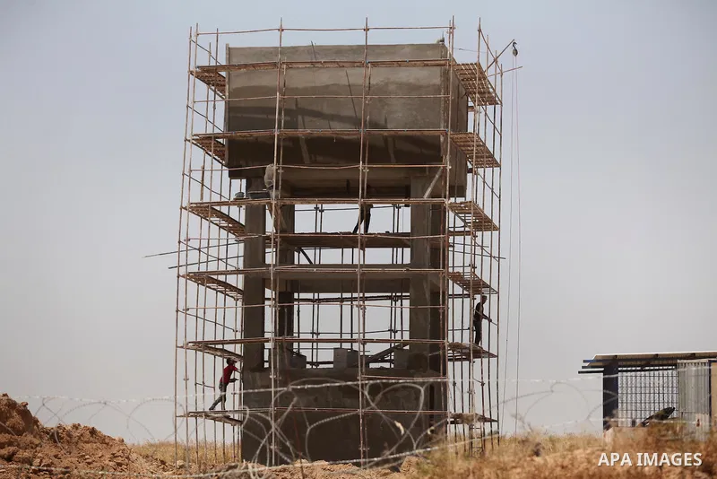 Palestinian workers built a well during the Workers' Day, in Khan Younis in the southern Gaza Strip May 1, 2016. Photo by Ashraf Amra