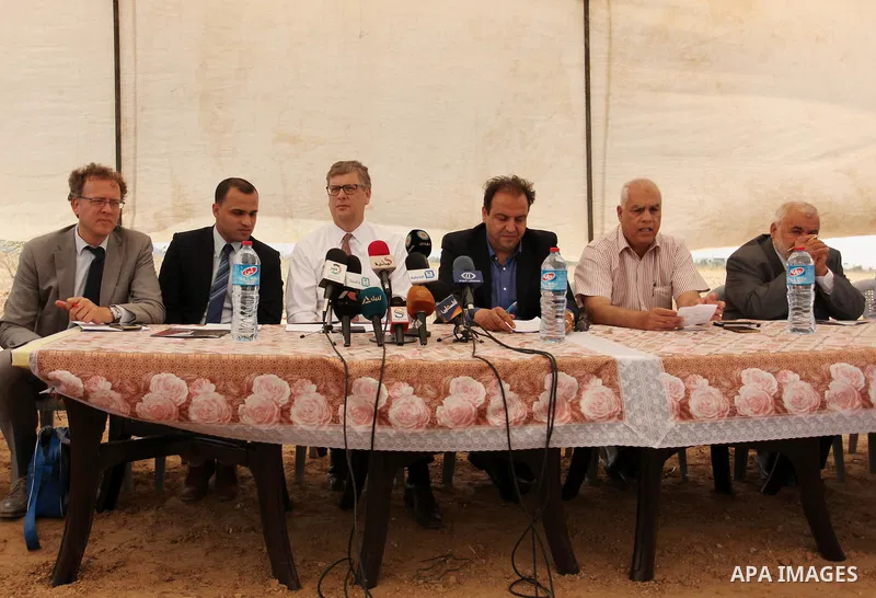 Representative for the Netherlands to the Palestinian Authority Peter Mollema speaks to media as he visits a Dutch-funded project aimed at suppling farms with water, in Khan Younis in the southern Gaza Strip May 1, 2016....