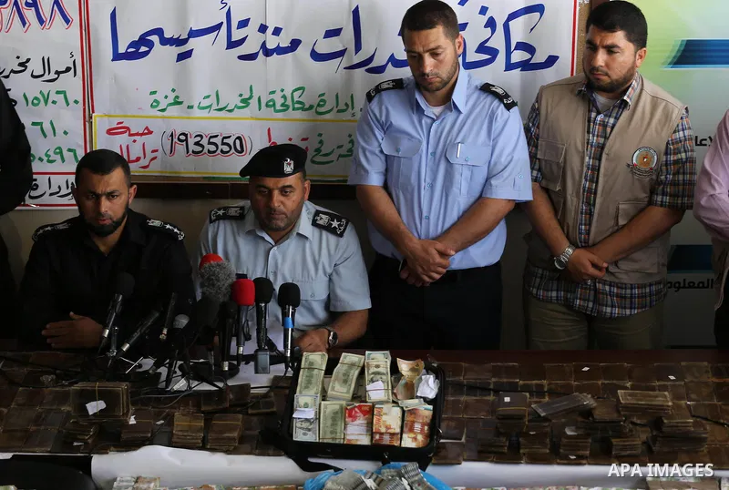 A spokesman for the Palestinian policemen, Ayman Batneeji speaks during a press conference drug damage in Gaza City on on May 2, 2016. Destroying the collected drugs was part of a new campaign by Hamas-run police to comb...