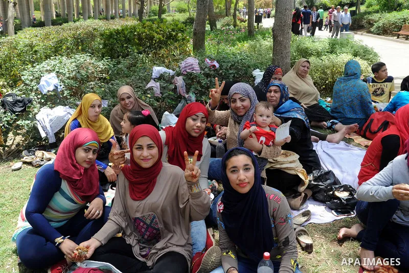 Egyptians gather at a garden marking Sham el-Nessim, or smelling the breeze which marks the beginning of spring, in Cairo, on May 02, 2016. Photo by Amr Sayed
