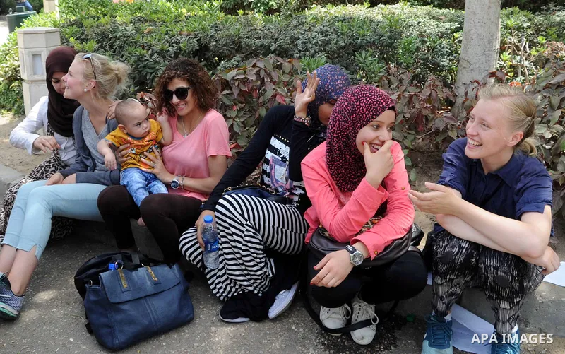 Egyptians gather at a garden marking Sham el-Nessim, or smelling the breeze which marks the beginning of spring, in Cairo, on May 02, 2016. Photo by Amr Sayed
