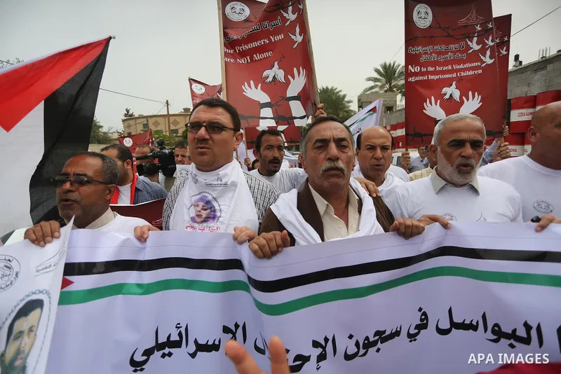 Palestinians take part in a protest demanding release the prisoners in Israeli jails, in front of the headquarter United Nation "UNSCO" in Gaza City, on May 3, 2016. Photo by Mohammed Asad
