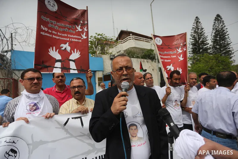 Palestinians take part in a protest demanding release the prisoners in Israeli jails, in front of the headquarter United Nation "UNSCO" in Gaza City, on May 3, 2016. Photo by Mohammed Asad