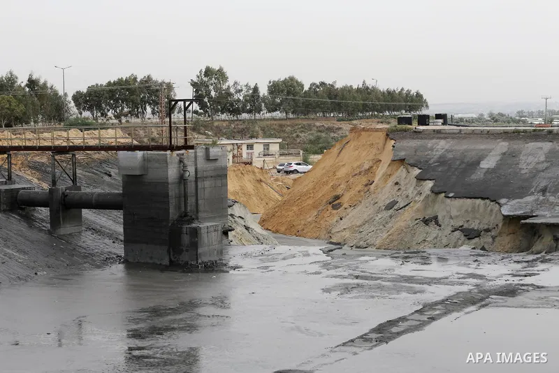 The damage are seen following the collapse one of sewage basins in the Zeitoun neighborhood, in Gaza city, on May 03, 2016. Photo by Mohammed Asad