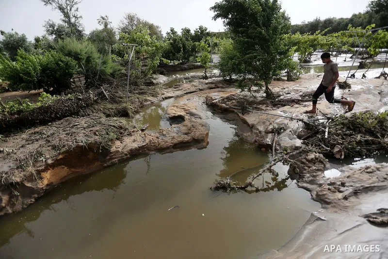 Palestinians inspect the damage following the collapse one of sewage basins in the Zeitoun neighborhood, in Gaza city, on May 03, 2016. Photo by Mohammed Asad
