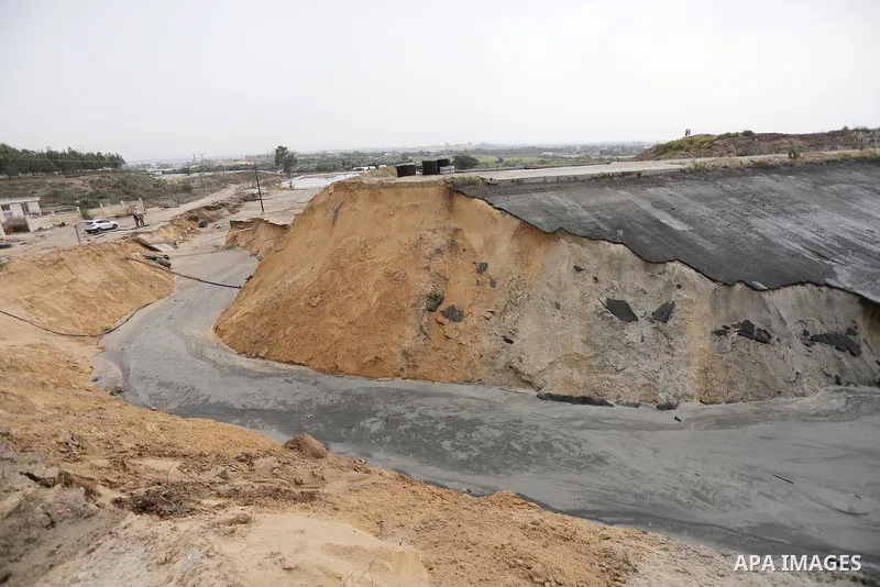 The damage are seen following the collapse one of sewage basins in the Zeitoun neighborhood, in Gaza city, on May 03, 2016. Photo by Mohammed Asad
