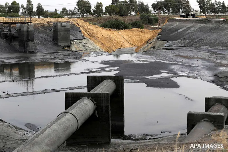 The damage are seen following the collapse one of sewage basins in the Zeitoun neighborhood, in Gaza city, on May 03, 2016. Photo by Mohammed Asad