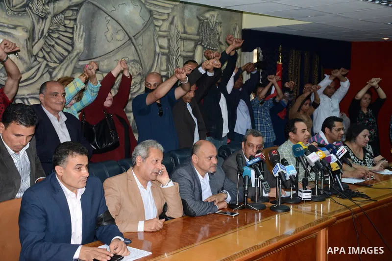 Egyptian Press Syndicate Chief Yahya Qalash reads a statement at the headquarters in the capital Cairo on May 3, 2016 on the occasion of World Press Freedom day, a day after police stormed the headquarters of the journal...